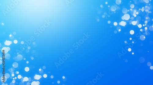 abstract blue background with bokeh lights and sunlight, panoramic background with copy space