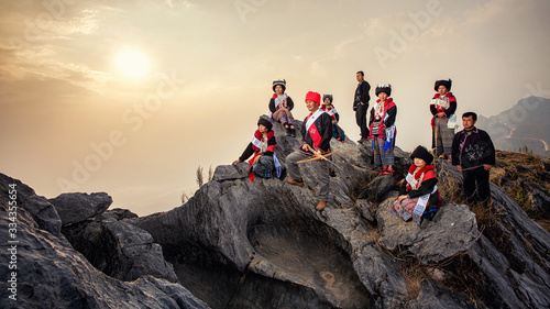 Yao or Mien hill tribe on Landscapes Sunrise twilight sky over high 103 mountains viewpoint at Banphatang Village ,Wiang Kaen District, Chiang Rai Province , Northwest Thailand.. photo