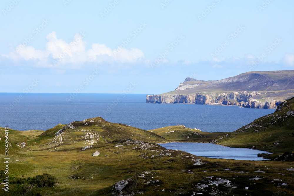 Scotland, UK - August 11, 2018: The coastline view of Scotland, Scotland, Highlands, United Kingdom Scotland, UK - August 11, 2018: The coastline view of Scotland, Scotland, Highlands, United Kingdom