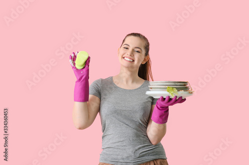 Woman with dirty dishes and...
