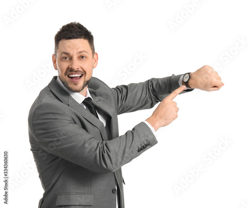 Businessman with watch on w...