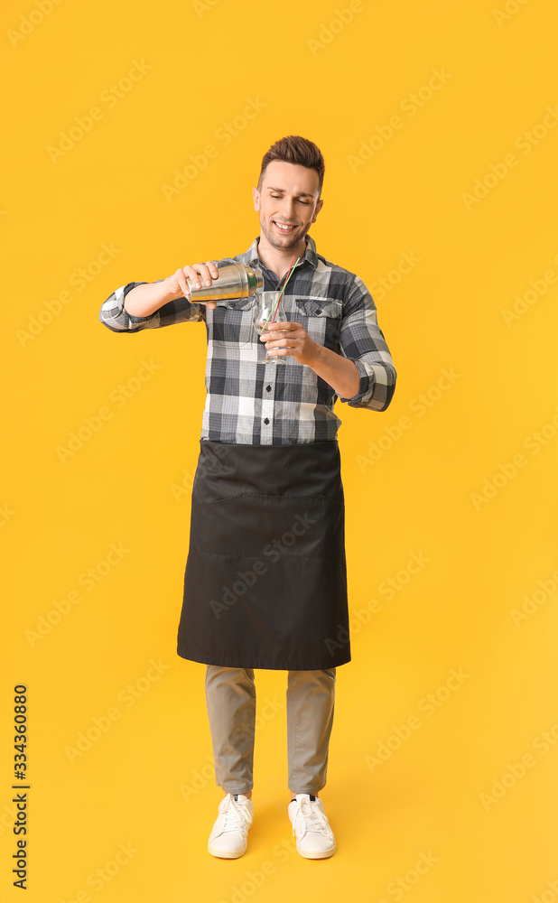 Handsome male bartender on color background Handsome male bartender on color background
