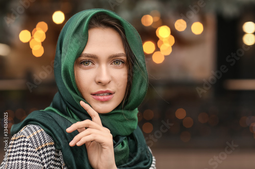 Beautiful young woman with ...