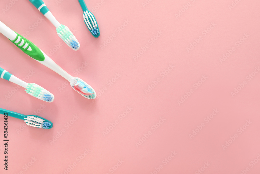 Tooth brushes with paste on color background Tooth brushes with paste on color background