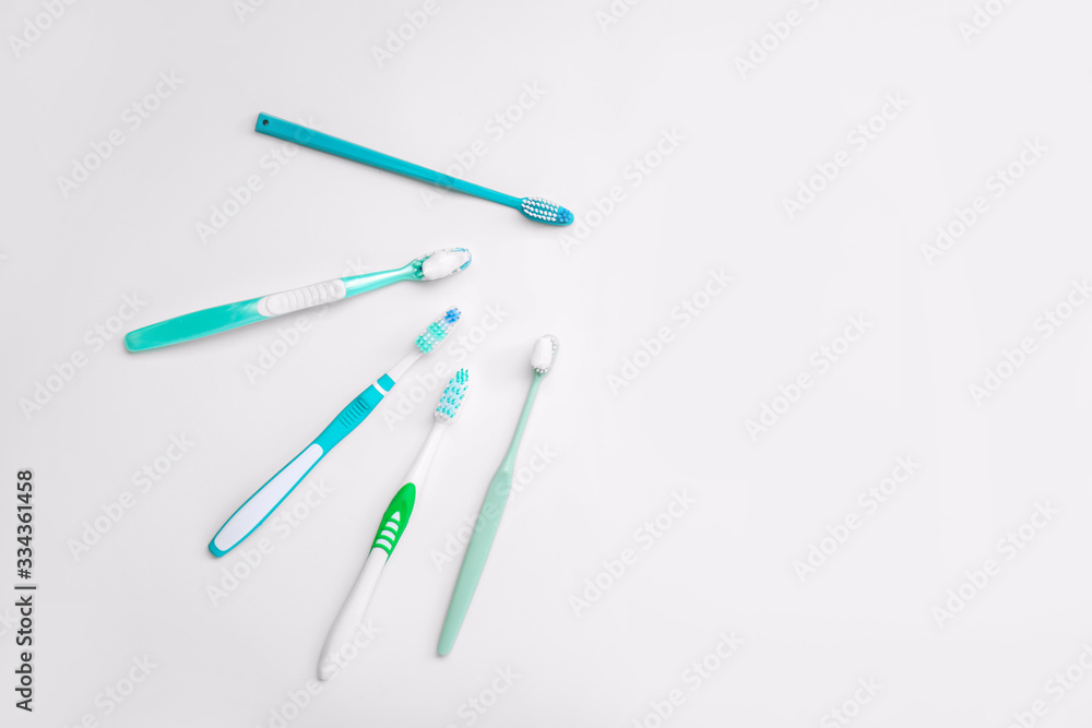 Tooth brushes with paste on white background Tooth brushes with paste on white background
