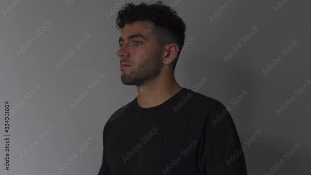 Caucasian Male using his asthma pump Caucasian Male using his asthma pump