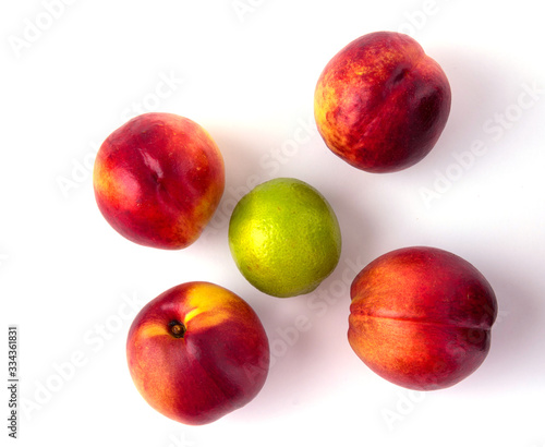 nectarines, laim on a white background in isolation