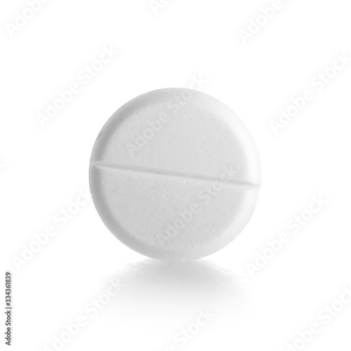 One pill on white background