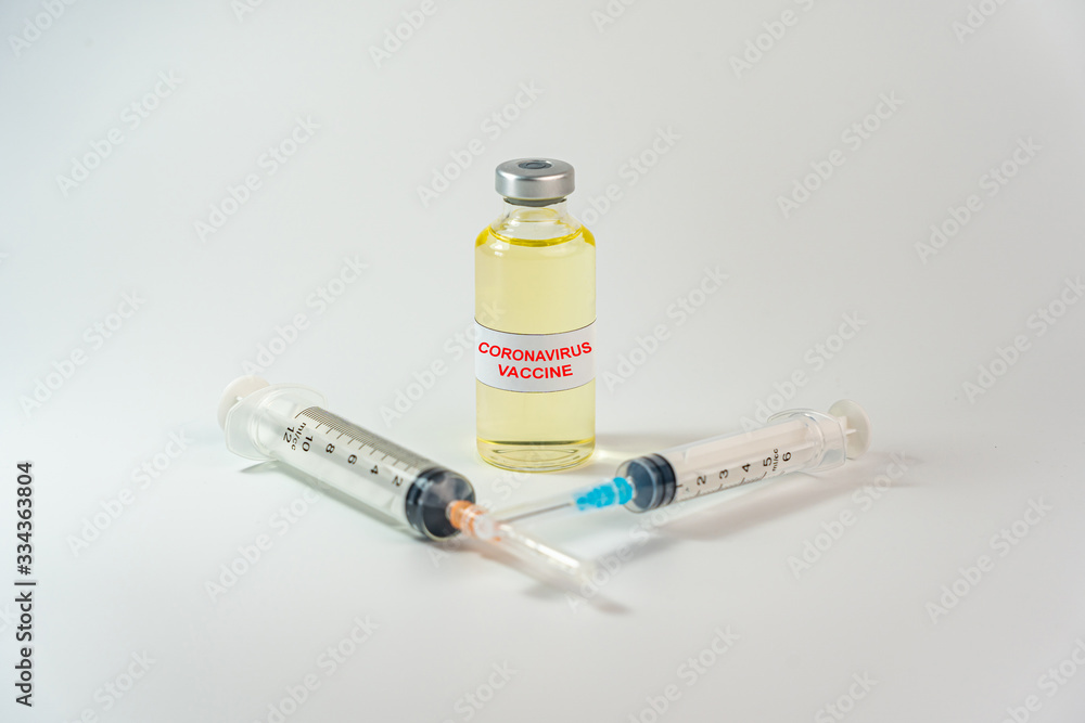 Coronavirus vaccine bottle on the white background Coronavirus vaccine bottle on the white background
