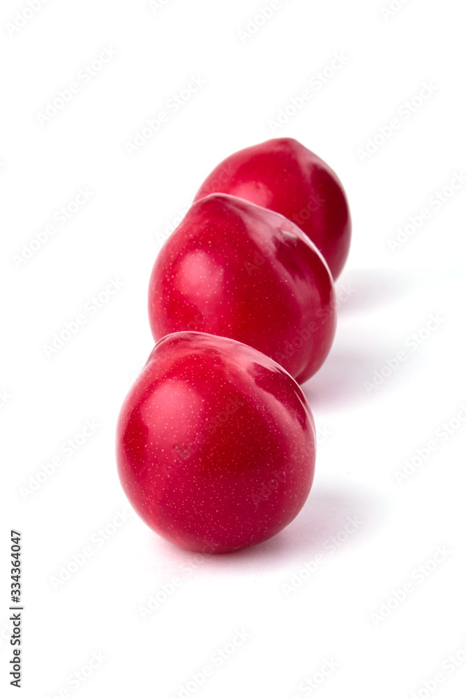 Plums, on a white background, isolated Plums, on a white background, isolated