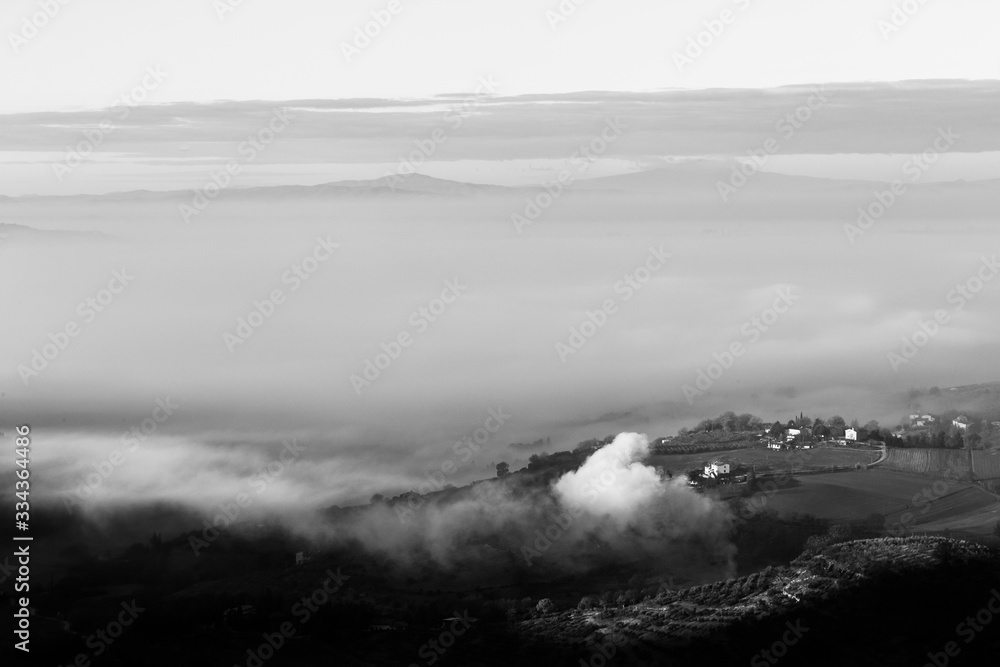 Sea of fog and mist between mountains and hills