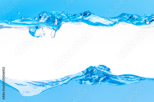 the Close up blue Water splash with bubbles on white background