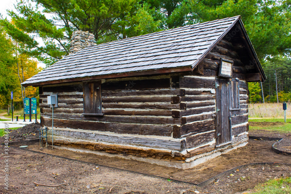 A wood dry cabin in a park A wood dry cabin in a park