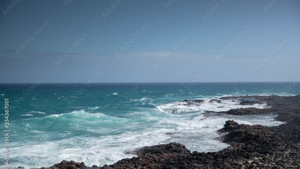 waves breaking on rocks, fuerteventura waves breaking on rocks, fuerteventura