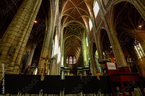 Ghent  Belgium  August 2019. Interior view of the Cathedral of San Bavo. We are impressed by the height and the slender lines of the pointed arch vaults. Red bricks.