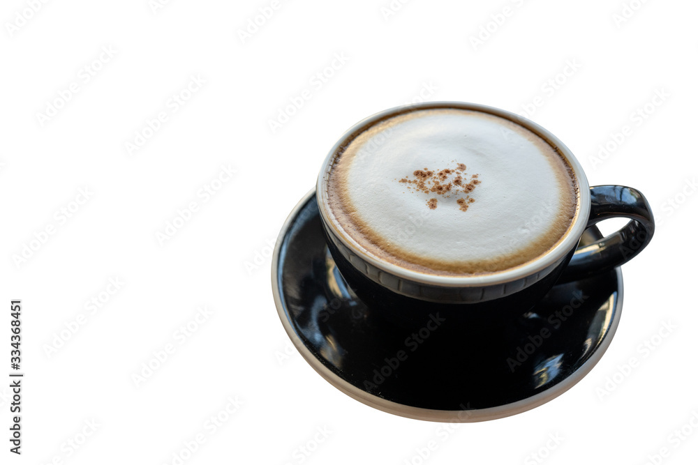 Latte coffee in a black cup and saucer From the top view, see a soft milk bubble on a white background with clipping path. Latte coffee in a black cup and saucer From the top view, see a soft milk bubble on a white background with clipping path.