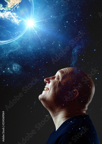 art portrait of a bald cheerful man on a black background