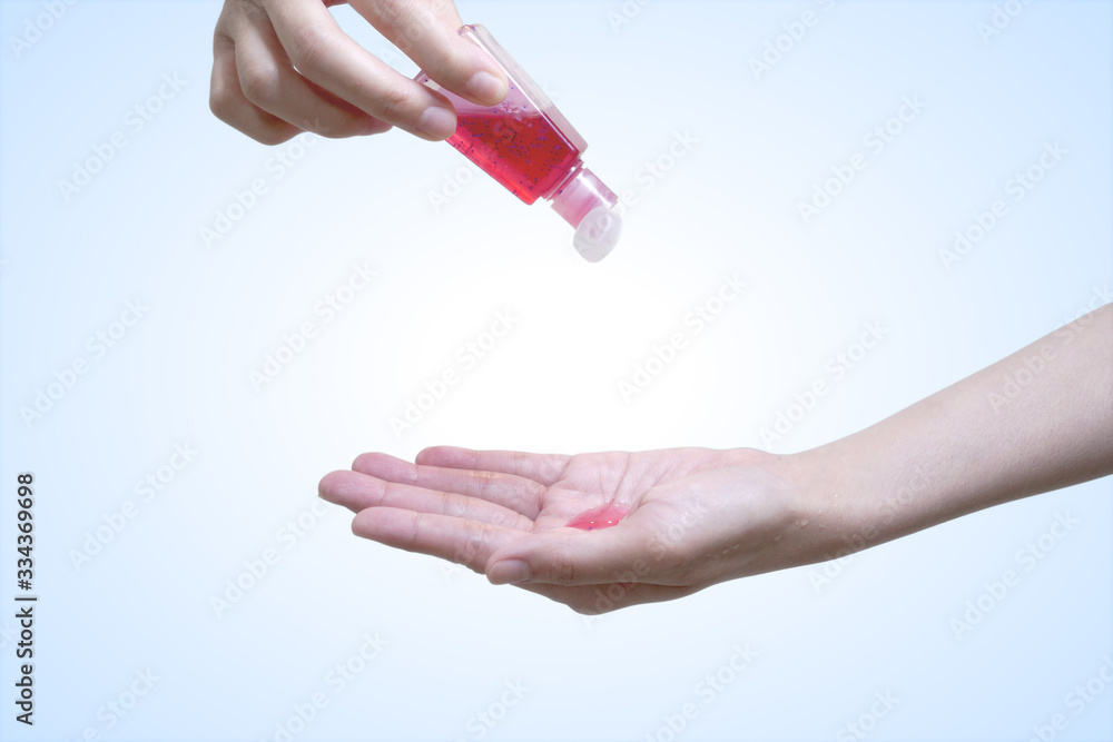 Squeeze Red hand Wash Gel on hands to Cleanup and protect Bacteria. Hand of woman that applying alcohol gel to make cleaning and clear germ, bacteria, Health care concept. Isolated with Clipping path Squeeze Red hand Wash Gel on hands to Cleanup and protect Bacteria. Hand of woman that applying alcohol gel to make cleaning and clear germ, bacteria, Health care concept. Isolated with Clipping path