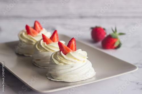 Dessert "Pavlova". Airy crispy meringue, delicate cheese cream and strawberries