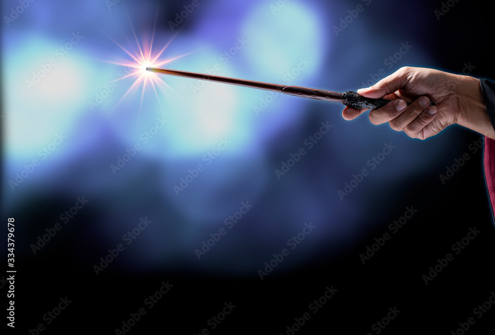 Magic wand with sparkle on miracle background, Miracle magical stick Wizard tool on hot background. Magic wand with sparkle on miracle background, Miracle magical stick Wizard tool on hot background.