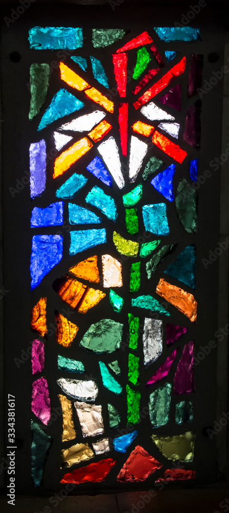 Nazareth, Israel, January 25, 2020: Basilica of the Annunciation - colorful stained glass windows