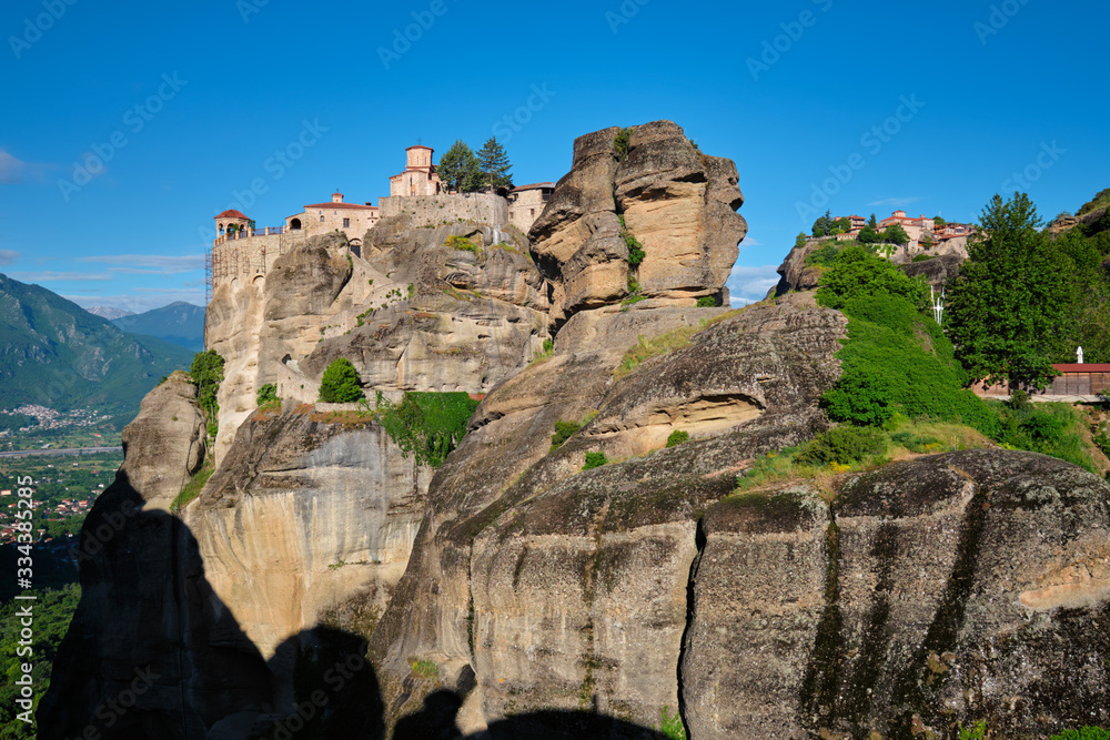 Monastery of Varlaam and Monastery of Great Meteoron in famous greek tourist destination Meteora in Greece on sunrise with scenic scenery landscape Monastery of Varlaam and Monastery of Great Meteoron in famous greek tourist destination Meteora in Greece on sunrise with scenic scenery landscape