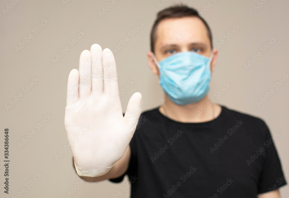 male hands in white medical gloves close up male hands in white medical gloves close up