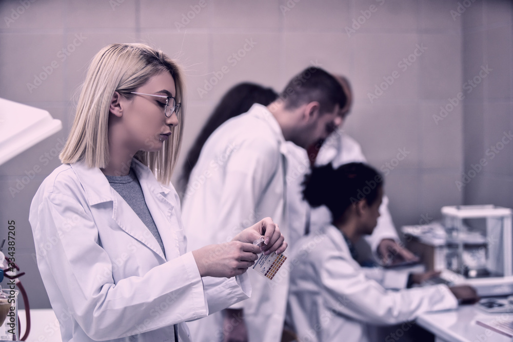 Laboratory scientist working at lab with test tube Laboratory scientist working at lab with test tube