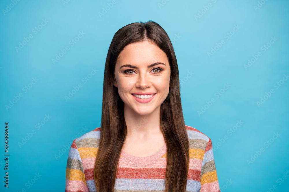 Fototapeta premium Close-up portrait of her she nice attractive lovely lovable cheerful cheery girl freelancer wearing striped pullover isolated over bright vivid shine vibrant blue color background