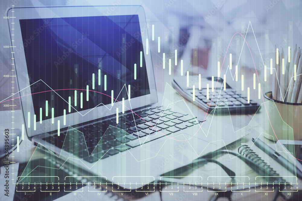 Double exposure of chart and financial info and work space with computer background. Concept of international online trading. Double exposure of chart and financial info and work space with computer background. Concept of international online trading.