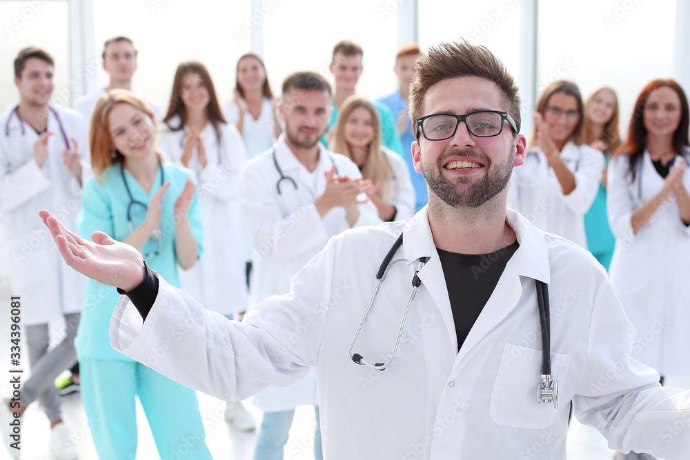 in full growth. young medical doctors standing ovation in full growth. young medical doctors standing ovation