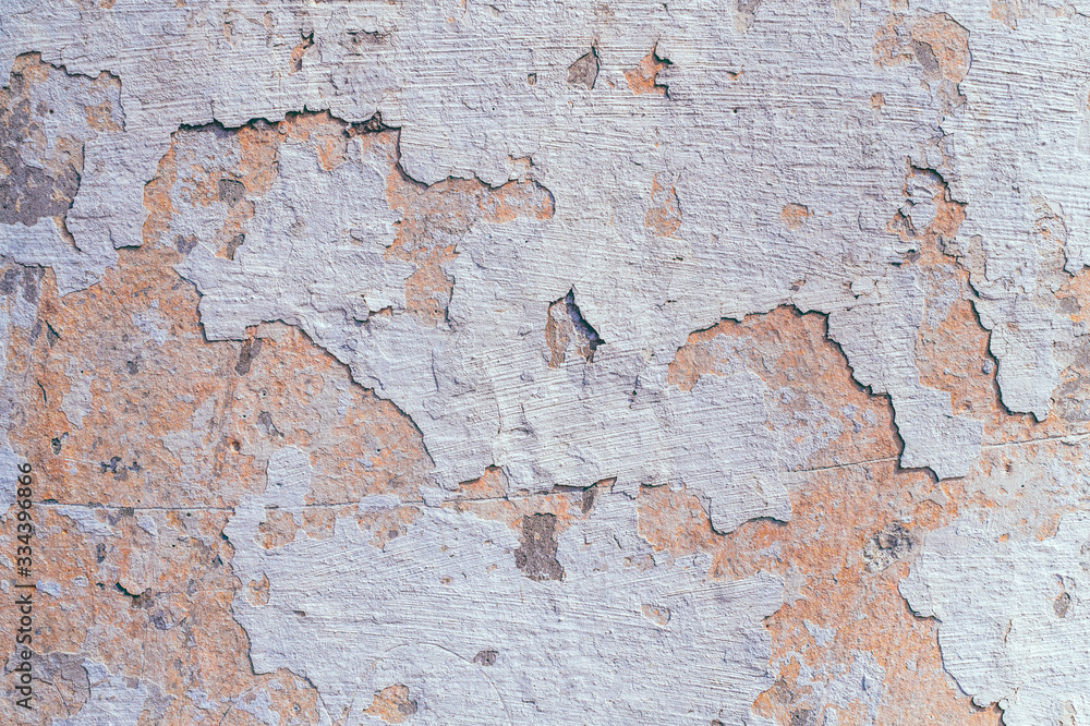 Old cracked and peeled wall with peeling stucco Old cracked and peeled wall with peeling stucco