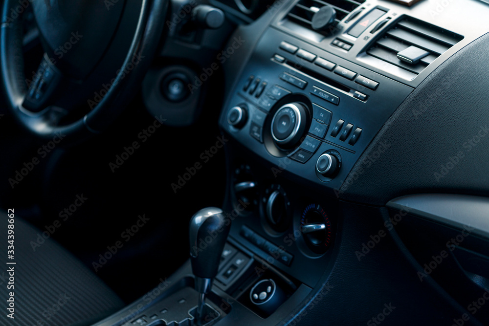 Fototapeta premium Modern car interior selective focus. Soft colored toned image. Best for wallpapers.