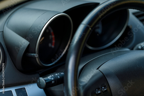 Close up view of the interior of a modern automobile showing the dashboard. © Inception