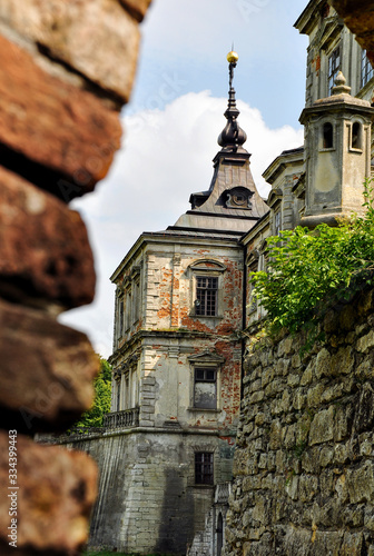 Fragment of Pidhirtsi castle in Lviv region. Pidhirtsi Palace in western Ukraine. Podgortsy village, renaissance palace. photo