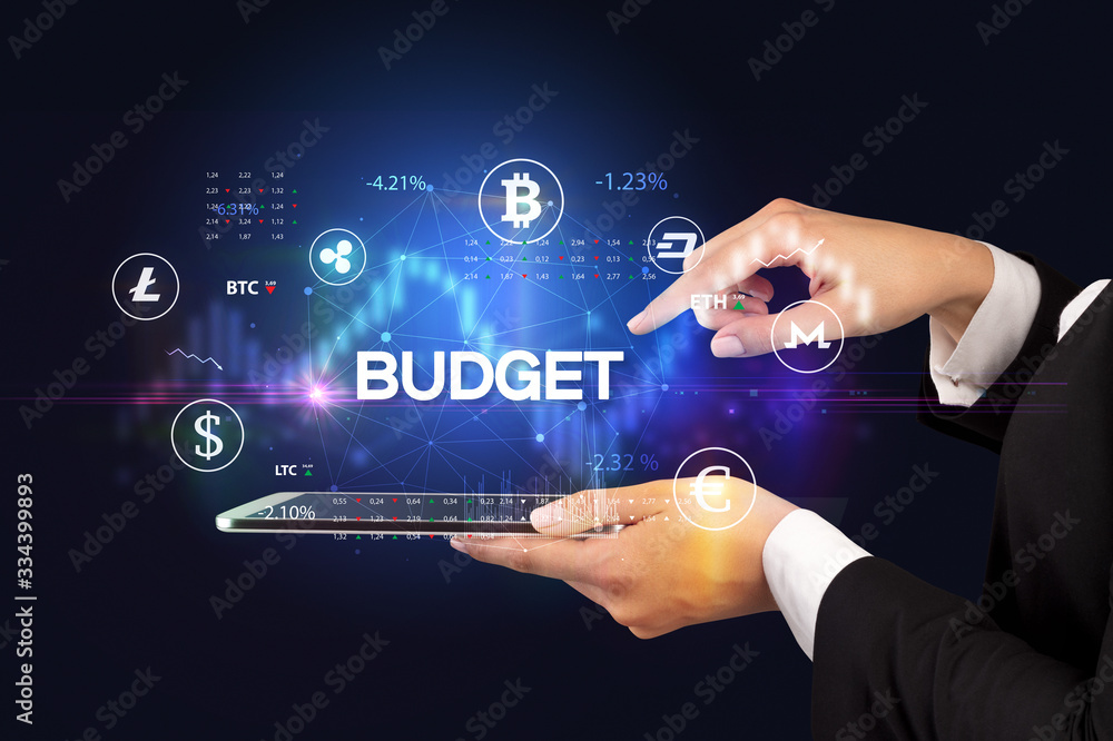 Close-up of a touchscreen with BUDGET inscription, business opportunity concept Close-up of a touchscreen with BUDGET inscription, business opportunity concept