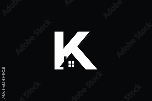 Logo design of K in vector for construction, home, real estate, building, property. Minimal awesome trendy professional logo design template on black background.