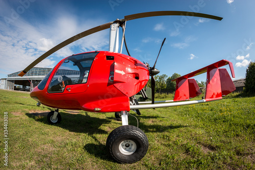 A fish-eye look at a red gyroplane photo