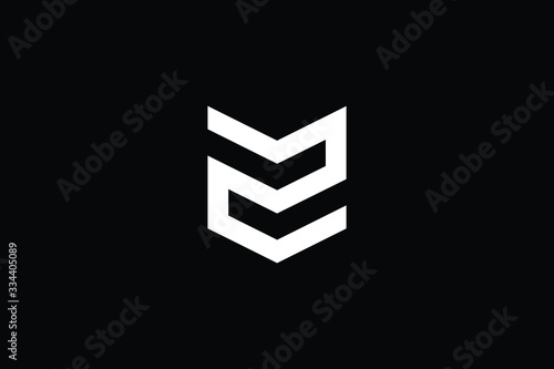 Logo design of Z ZM MZ in vector for construction, home, real estate, building, property. Minimal awesome trendy professional logo design template on black background.