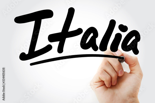 Hand writing Italia with marker, concept background photo