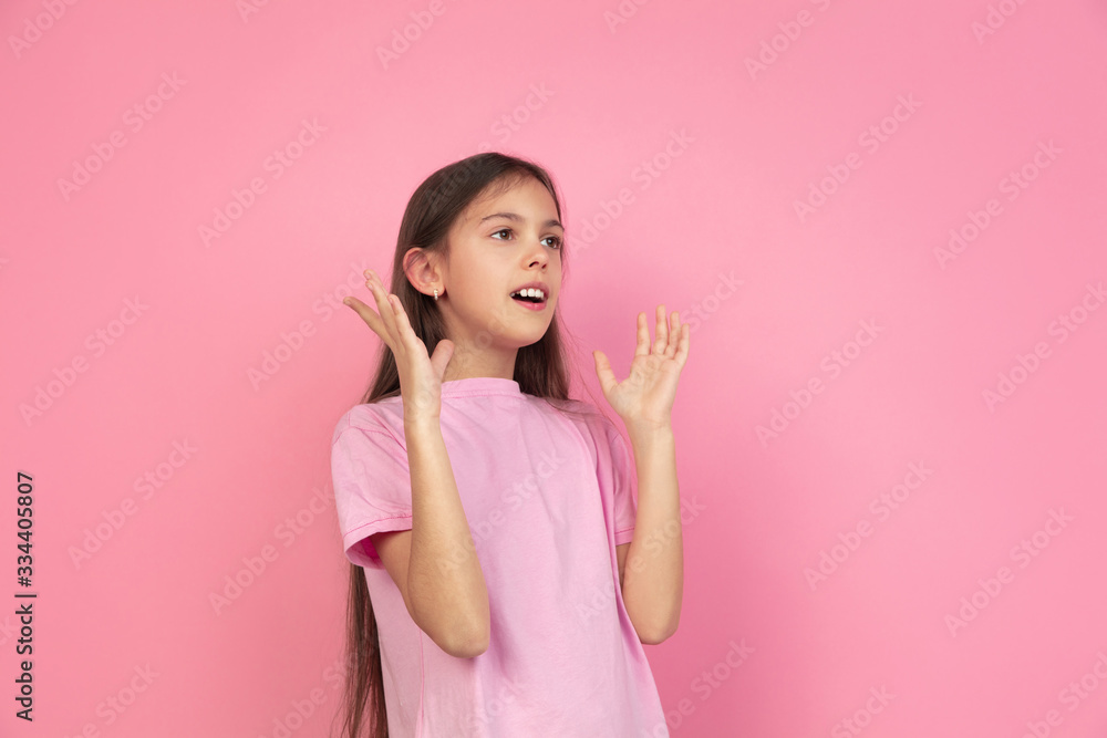 Astonished, shocked. Caucasian little girl portrait isolated on pink studio background. Cute brunette model in shirt. Concept of human emotions, facial expression, sales, ad, childhood. Copyspace. Astonished, shocked. Caucasian little girl portrait isolated on pink studio background. Cute brunette model in shirt. Concept of human emotions, facial expression, sales, ad, childhood. Copyspace.