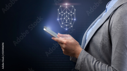 Face recognition. Businesswoman holding cellphone with hologram of human face on dark background, collage