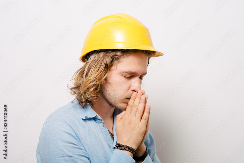 Construction worker praying Construction worker praying