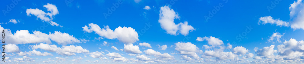 Panoramic fluffy cloud in the blue sky. Sky with cloud on a sunny day. - obrazy, fototapety, plakaty 