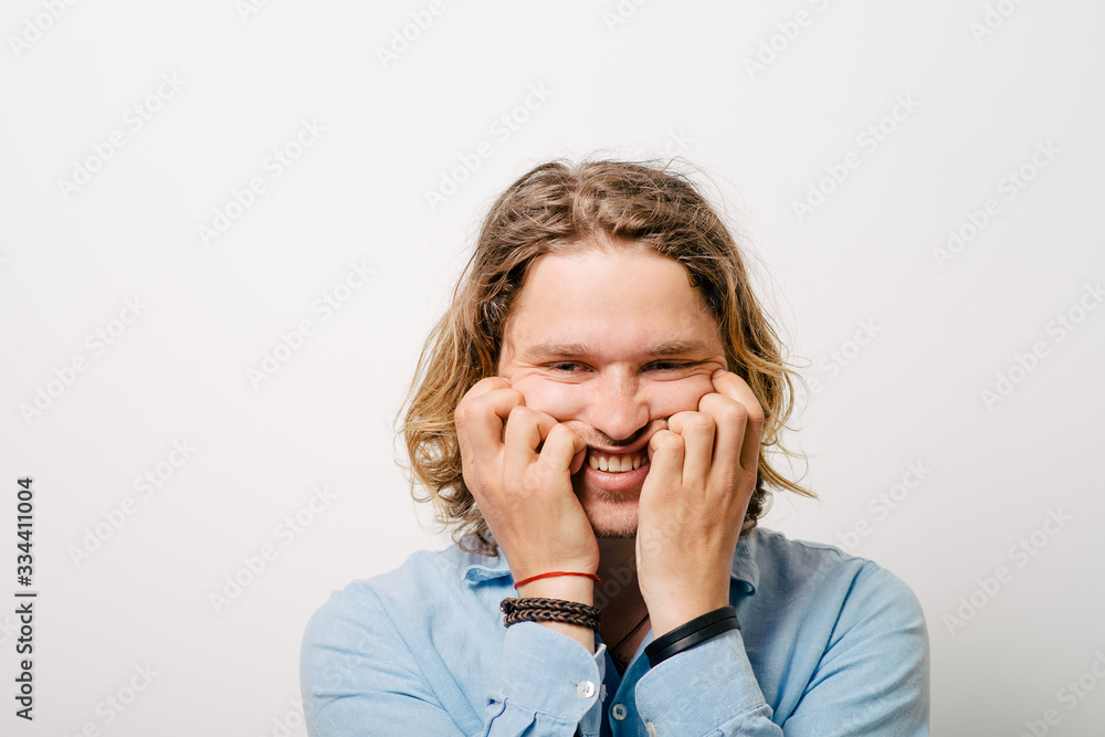 man bites his nails