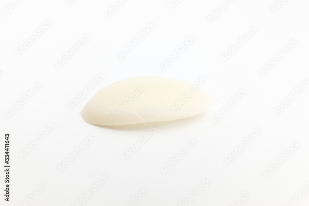 White rice cake sliced on white background White rice cake sliced on white background