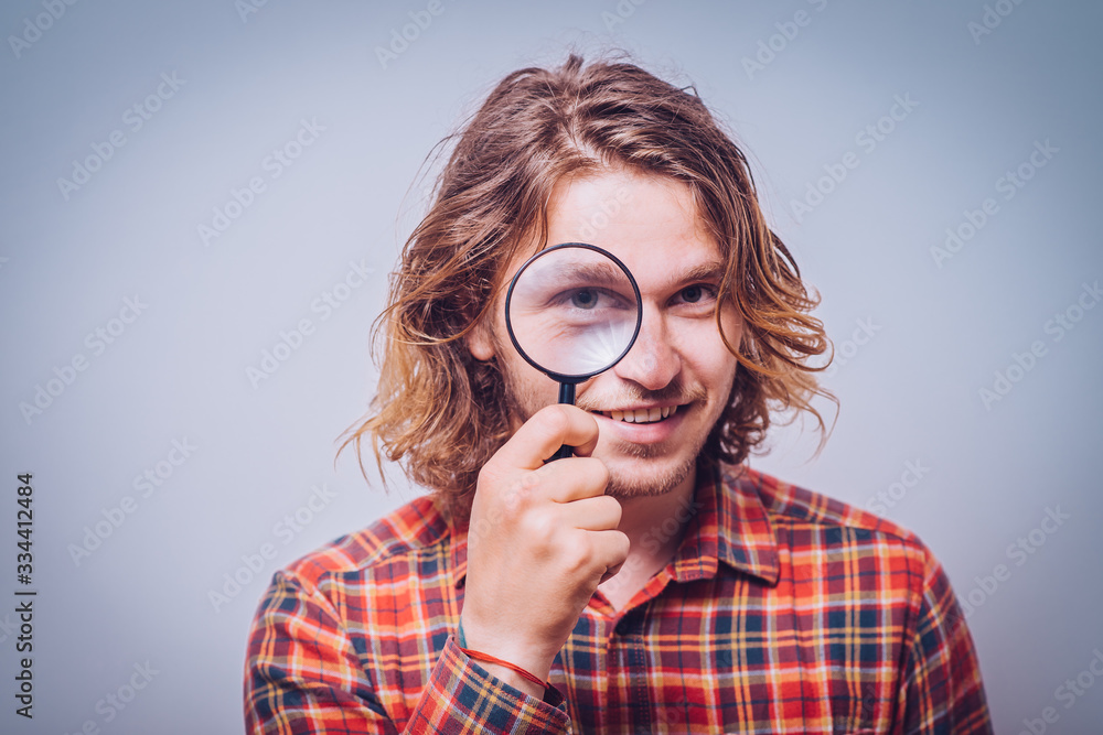 The man with a magnifier The man with a magnifier