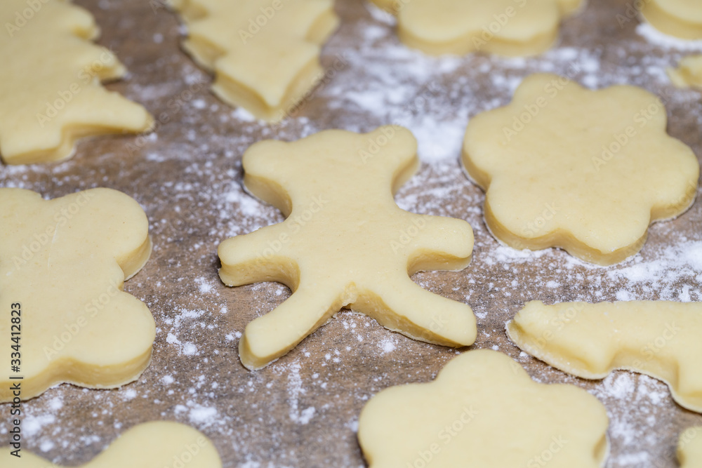 cooking homemade delicious cookies of different figures from the dough cooking homemade delicious cookies of different figures from the dough