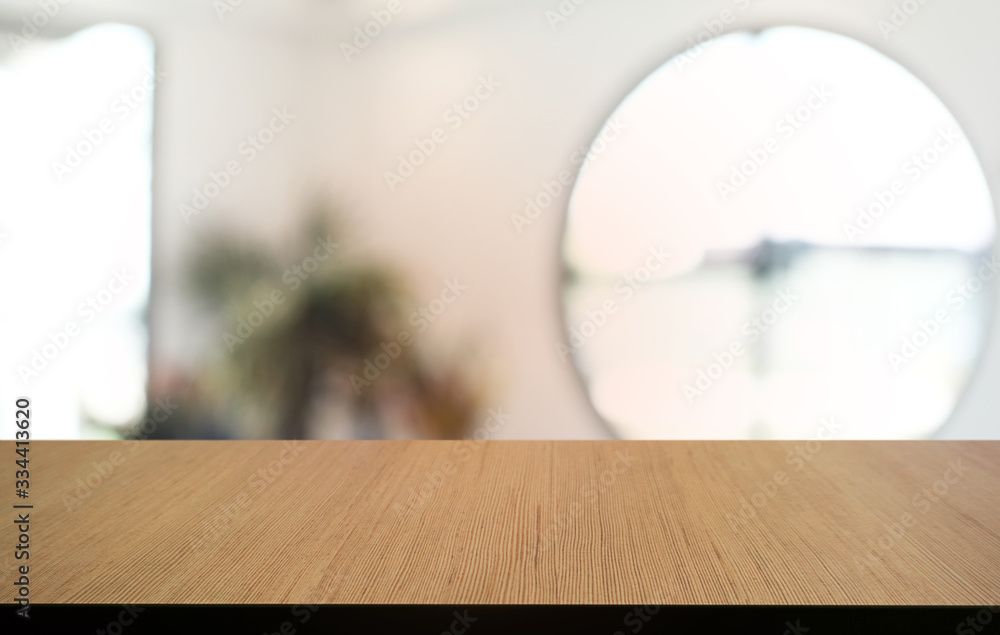 Empty dark wooden table in front of abstract blurred bokeh background of restaurant . can be used for display or montage your products.Mock up for space. Empty dark wooden table in front of abstract blurred bokeh background of restaurant . can be used for display or montage your products.Mock up for space.