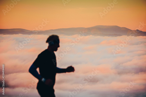 Runner in sunny autumn morning  sunrise light